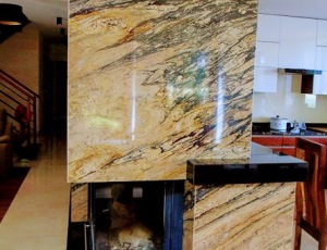 Obudowa kominka z granitu Sahara Gold / Merkam